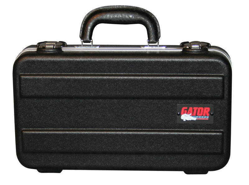 GATOR GM-6-PE Durable polyethylene construction • Triple chrome plated locking latches • Compact briefcase design • 6 Foam form fitted mic spaces