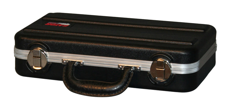 GATOR GM-6-PE Durable polyethylene construction • Triple chrome plated locking latches • Compact briefcase design • 6 Foam form fitted mic spaces