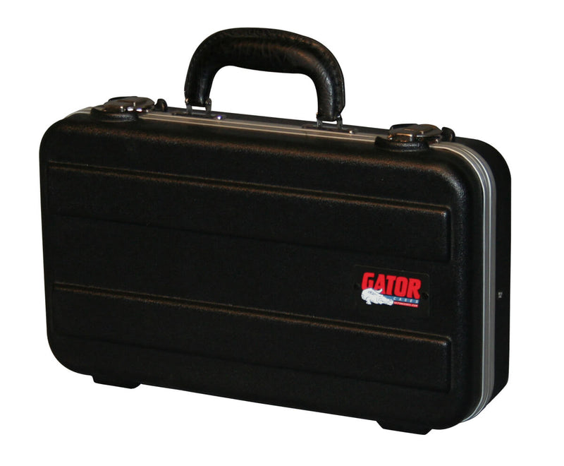 GATOR GM-6-PE Durable polyethylene construction • Triple chrome plated locking latches • Compact briefcase design • 6 Foam form fitted mic spaces